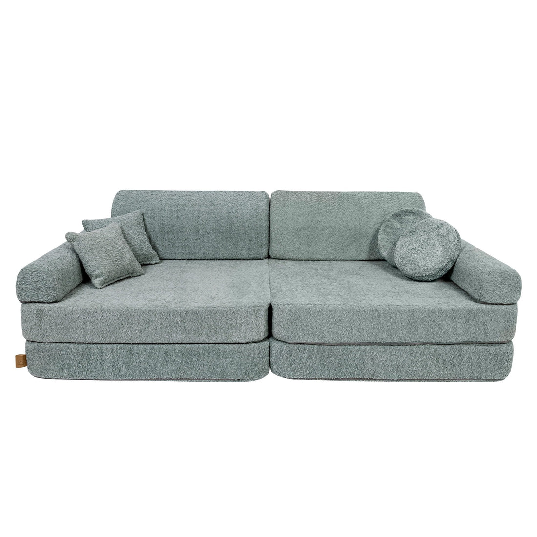 1. Large modular children's sofa in fresh mint boucle fabric with two square and one round cushion, shown in a studio setting