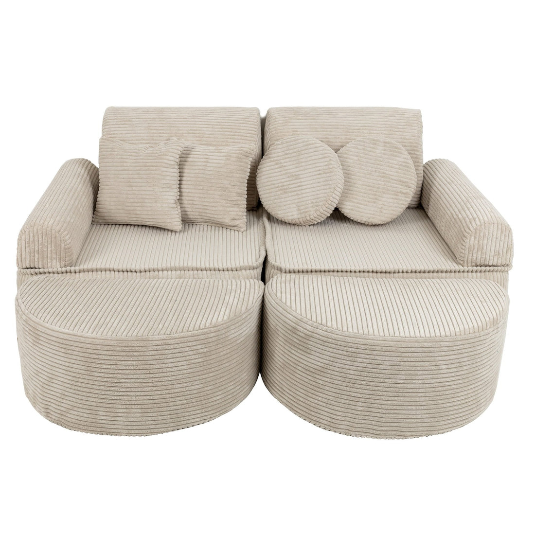 1. Modular children's sofa in aesthetic ecru with ribbed texture, featuring two seats, armrests, and multiple cushions, shown in a studio setting.