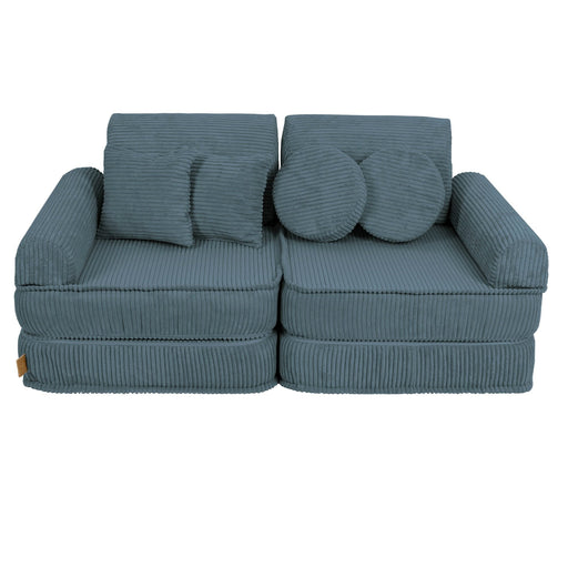 1. Medium modular children's sofa in aesthetic turquoise with ribbed texture, featuring two back cushions and two round pillows, shown in a studio setting