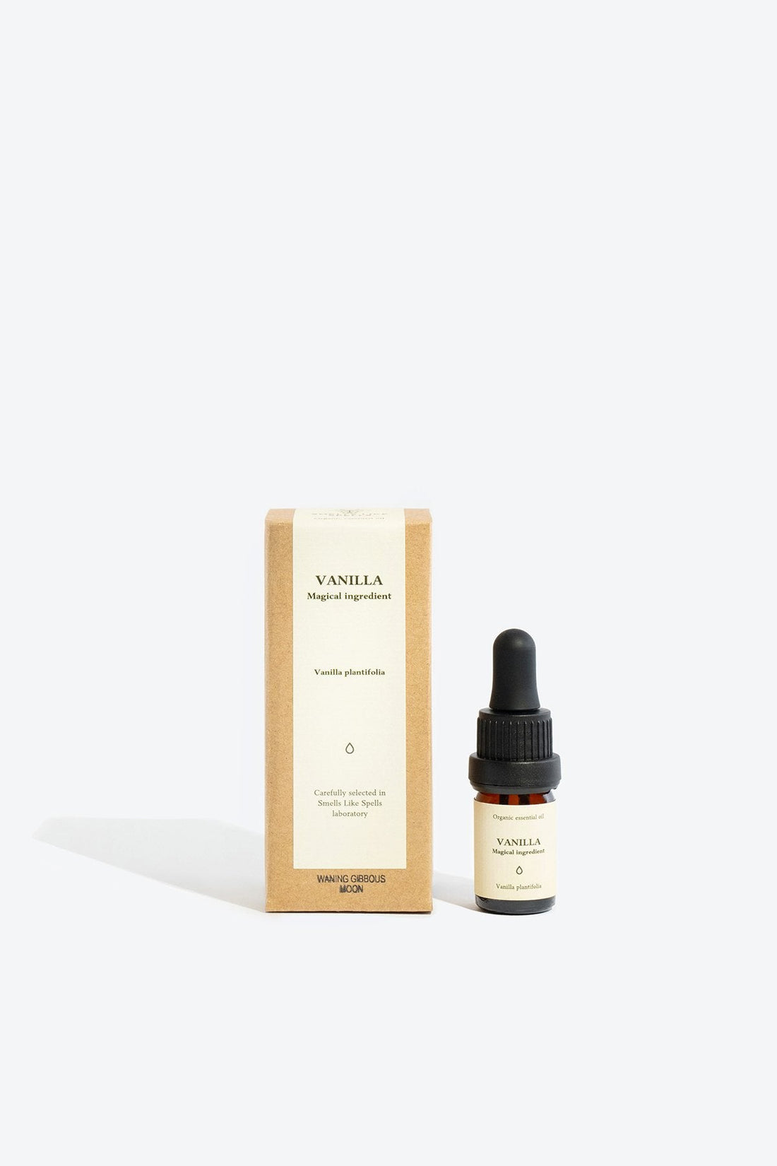 1. Smells Like Spells VANILLA Essential Oil 5 ml with packaging, featuring glass bottle and pipette, studio setting