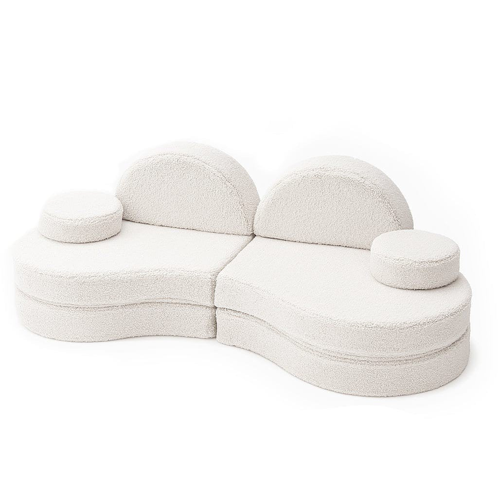 1. Modular kids' sofa in Bearly off-white with rounded shapes, shown in a two-piece configuration with circular cushions and backrests on a white background