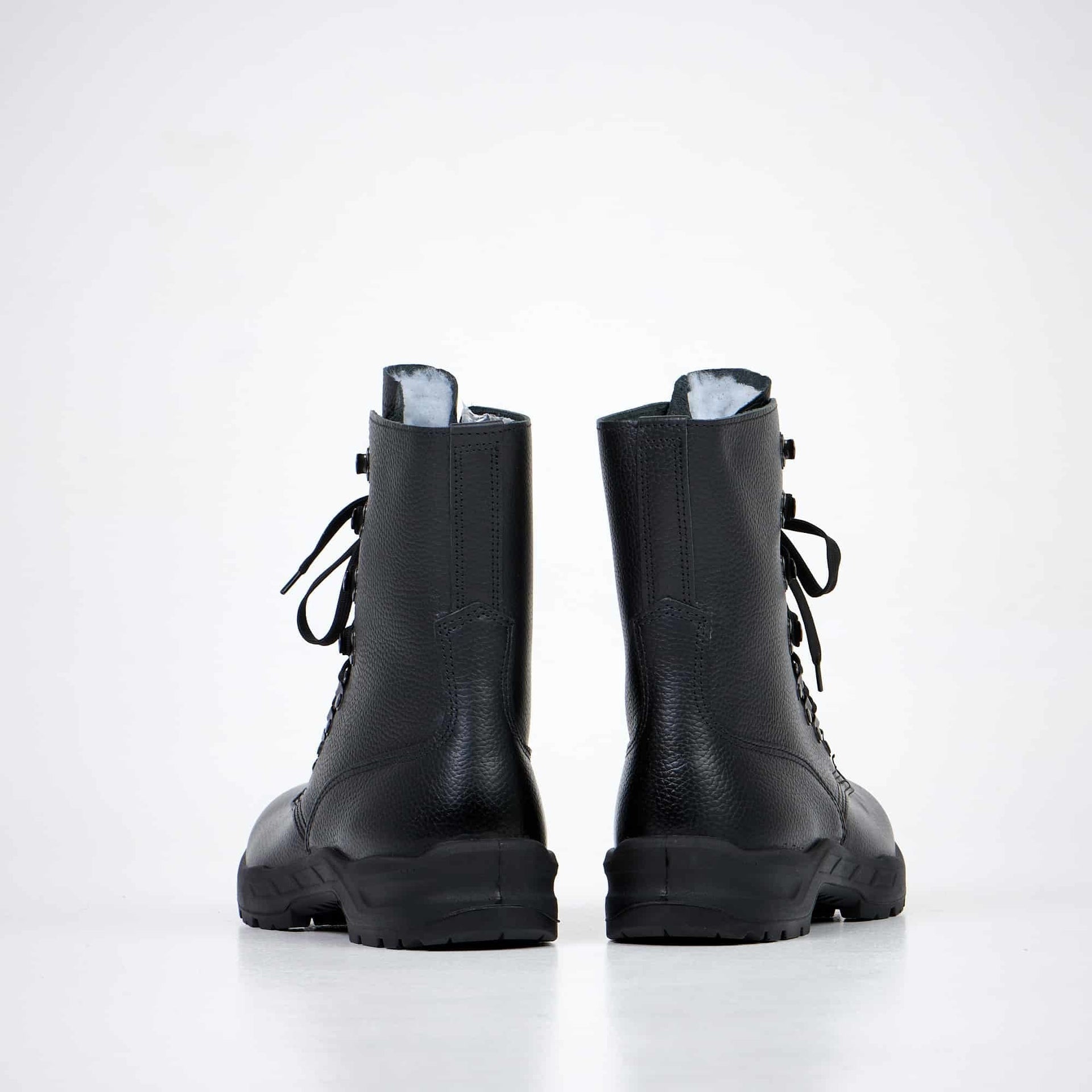 1. Back view of Samelin 2077 Combat Boots in black leather, showcasing dual-layer sole and high-top design