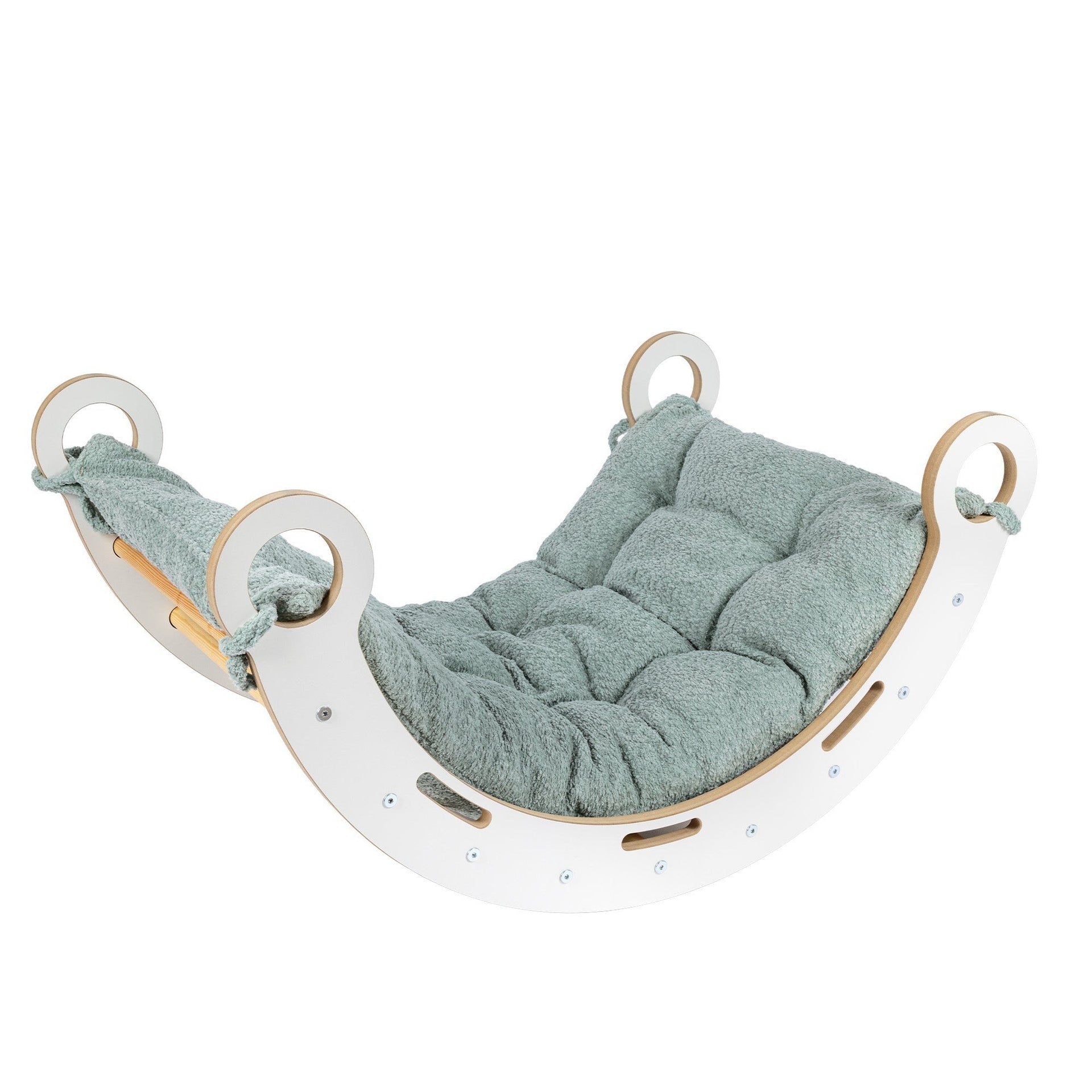 1. Snug Rocker for kids with fresh mint pillow, made of birch plywood, shown in a studio setting