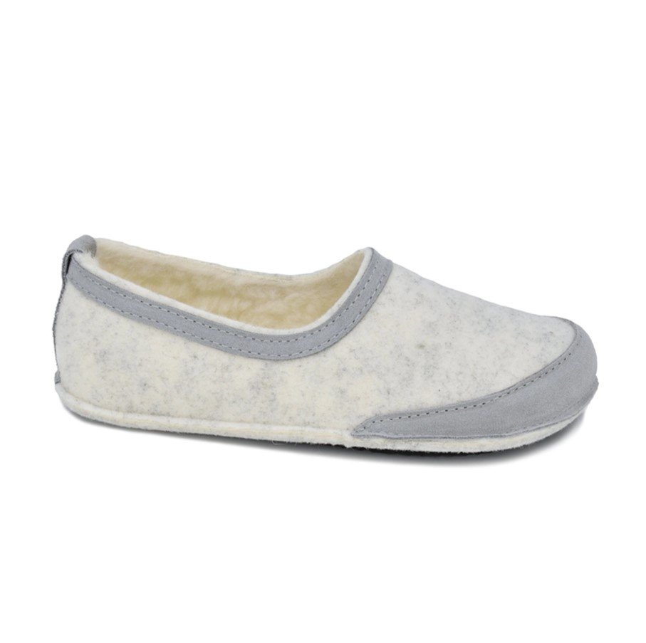 1. Omaking barefoot indoor slippers with lambswool lining in studio setting, side view