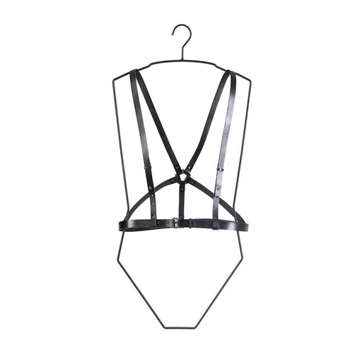 1. Women's black leather body harness by RR worn over a yellow floral dress, showcasing versatile styling