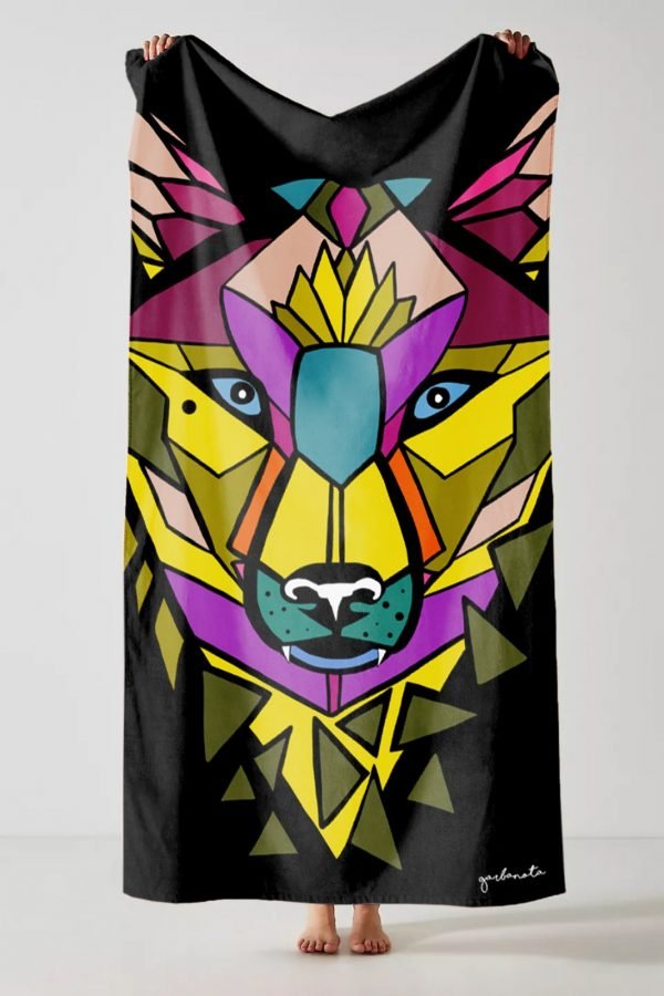 2. Studio shot of Garbanota Towel Colored Wolf in black featuring colorful geometric wolf pattern