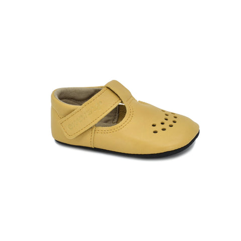 5. Side view of Omaking yellow Mutsu slipper, highlighting foot-shaped toe box and soft outsole