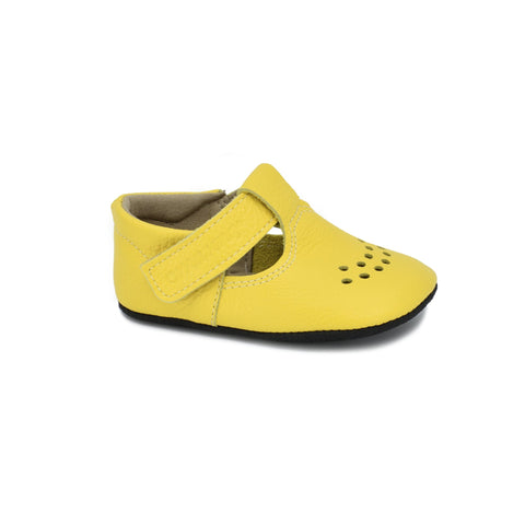 3. Side view of a single Omaking kids' Mutsu slipper in bright yellow, highlighting adjustable Velcro fastener and soft leather upper