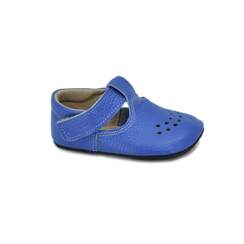2. Side view of kids' electric blue Mutsu slipper by OmaKing, featuring soft leather upper and anti-slip sole