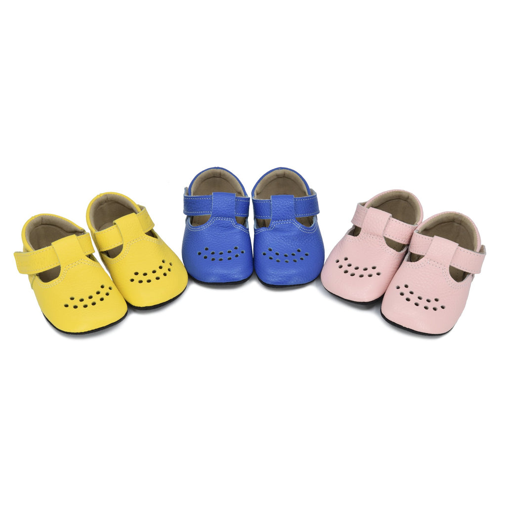 1. Collection of Omaking kids' slippers in bright yellow, blue, and pink, featuring wide toe box and Velcro fastener