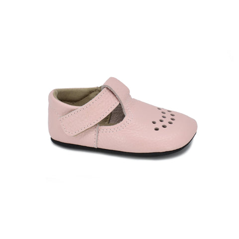 1. Kids' light pink Mutsu slipper by Omaking, featuring extra soft leather upper and adjustable Velcro fastener, shown in studio