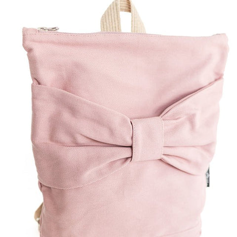 3. Close-up of Muni kids pink bow backpack showing large bow detail