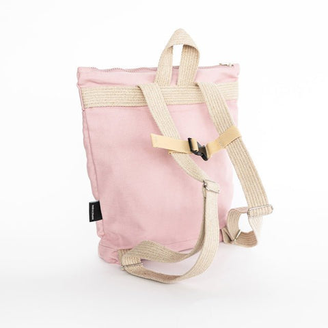 2. Back view of Muni kids pink bow backpack with adjustable straps in studio
