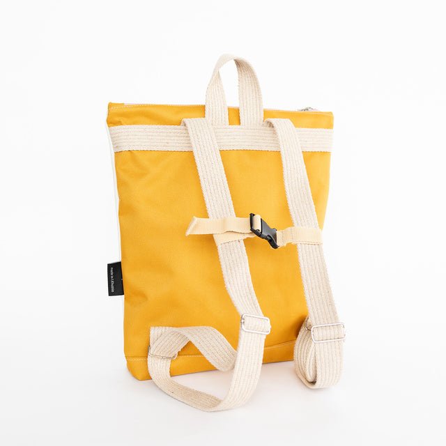 3. Back view of Muni kids backpack with adjustable straps in yellow polyester