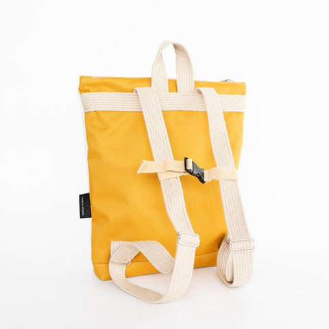 3. Back view of Muni kids backpack with adjustable straps in yellow polyester