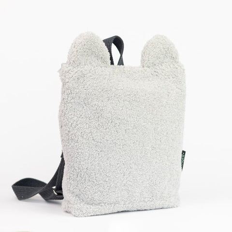 5. Studio image of Muni grey teddy backpack, highlighting the front design and plush texture