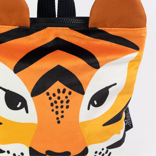 6. Close-up of Muni Tiger backpack, highlighting detailed tiger face and velvet texture