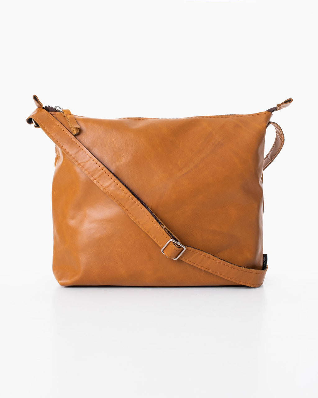 1. Trendbag Anet L shoulder bag in caramel leather shown in studio setting