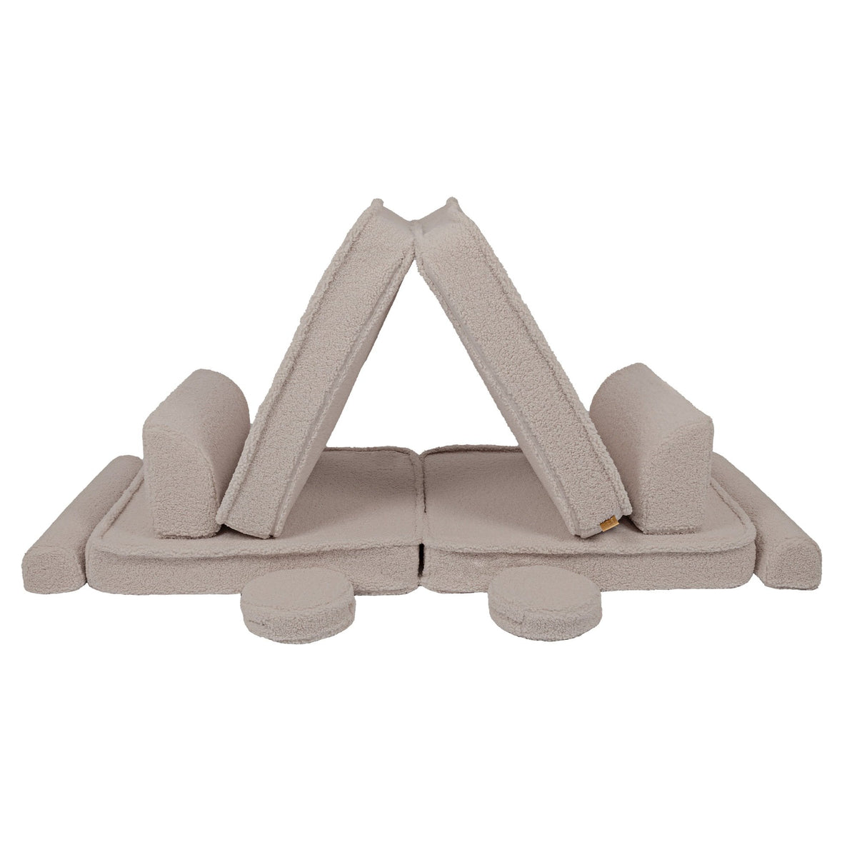 4. Light grey modular sofa pieces arranged in a tent-like structure, showcasing versatility
