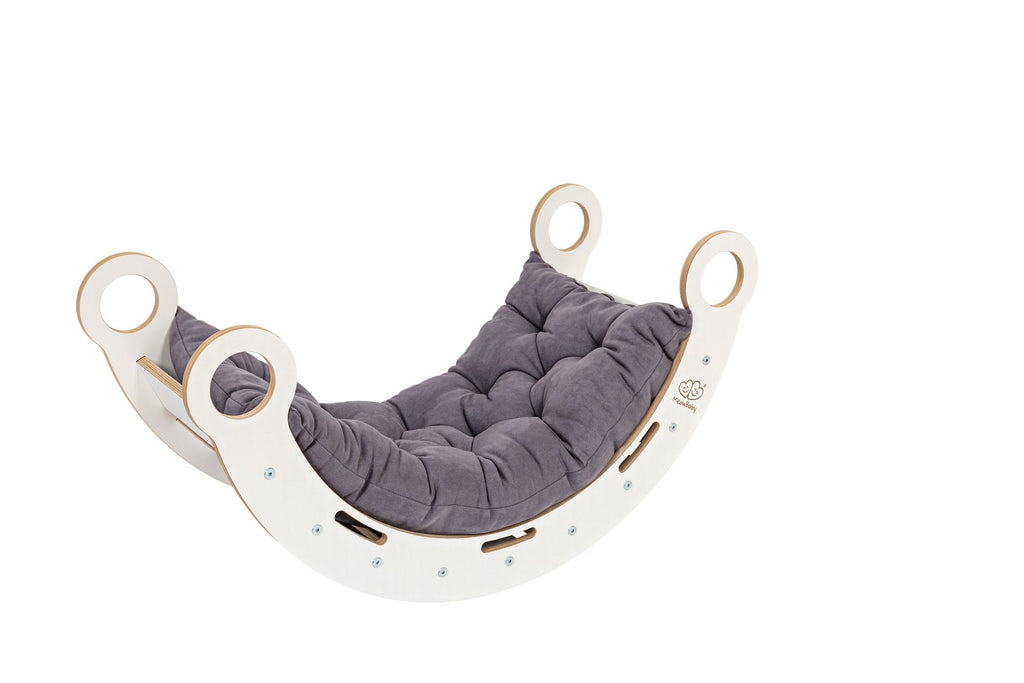 2. White wooden dream rocker with grey cushion on black background