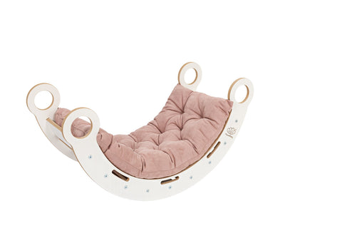 1. White wooden dream rocker with pink cushion on black background