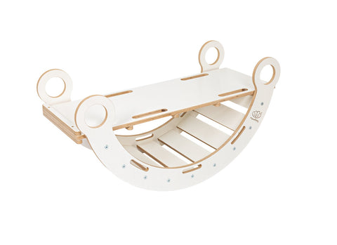 1. White wooden dream rocker with slide attachment on black background