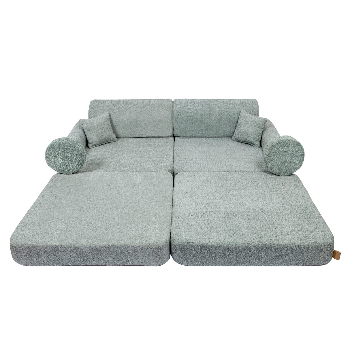 3. Modular children's sofa in fresh mint boucle fabric, fully extended with cushions, shown in a studio setting