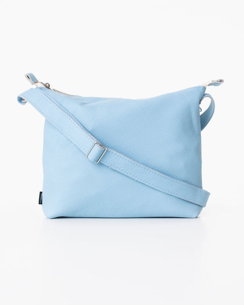 2. Studio image of Trendbag Anet L shoulder bag in light blue, front view highlighting adjustable strap