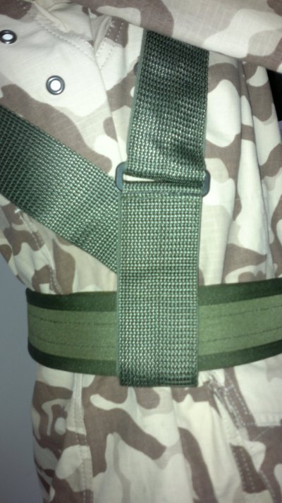 3. Close-up of Galvi Linda adjustable polyester straps on camouflage uniform, showing buckle detail