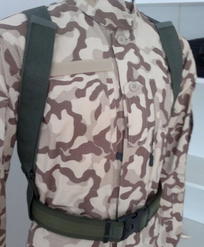 1. Galvi Linda military-grade equipment straps worn over camouflage uniform, shown in studio setting