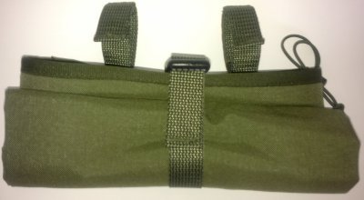 3. Flat lay of Galvi Linda military green roll-up equipment pouch, showing compact folded design and attachment loops