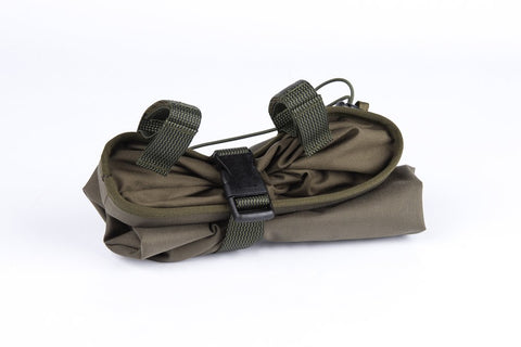 3. Compactly rolled Galvi Linda military green equipment pouch with buckle and strap details