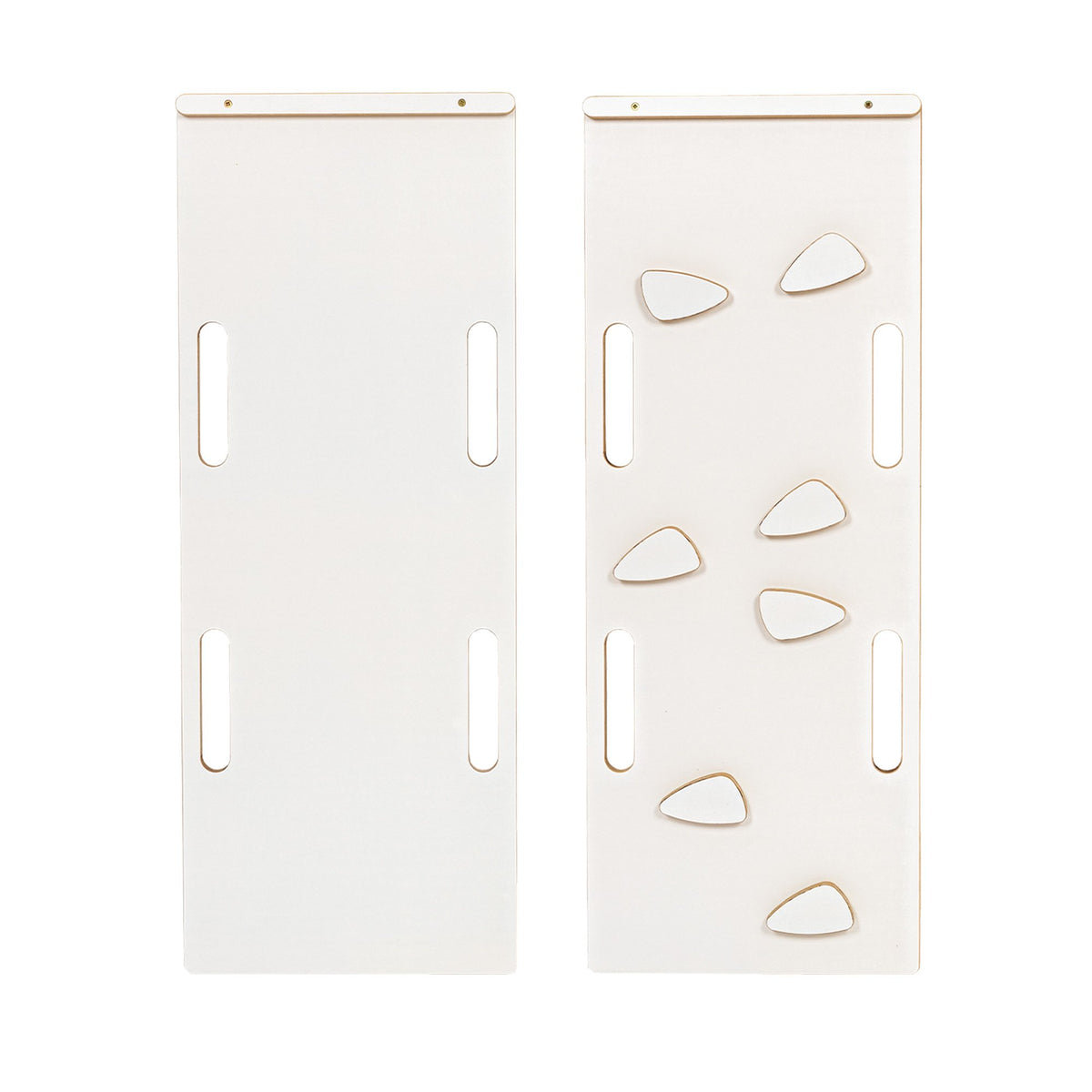 4. Flat lay of white slide components with climbing holds showing design