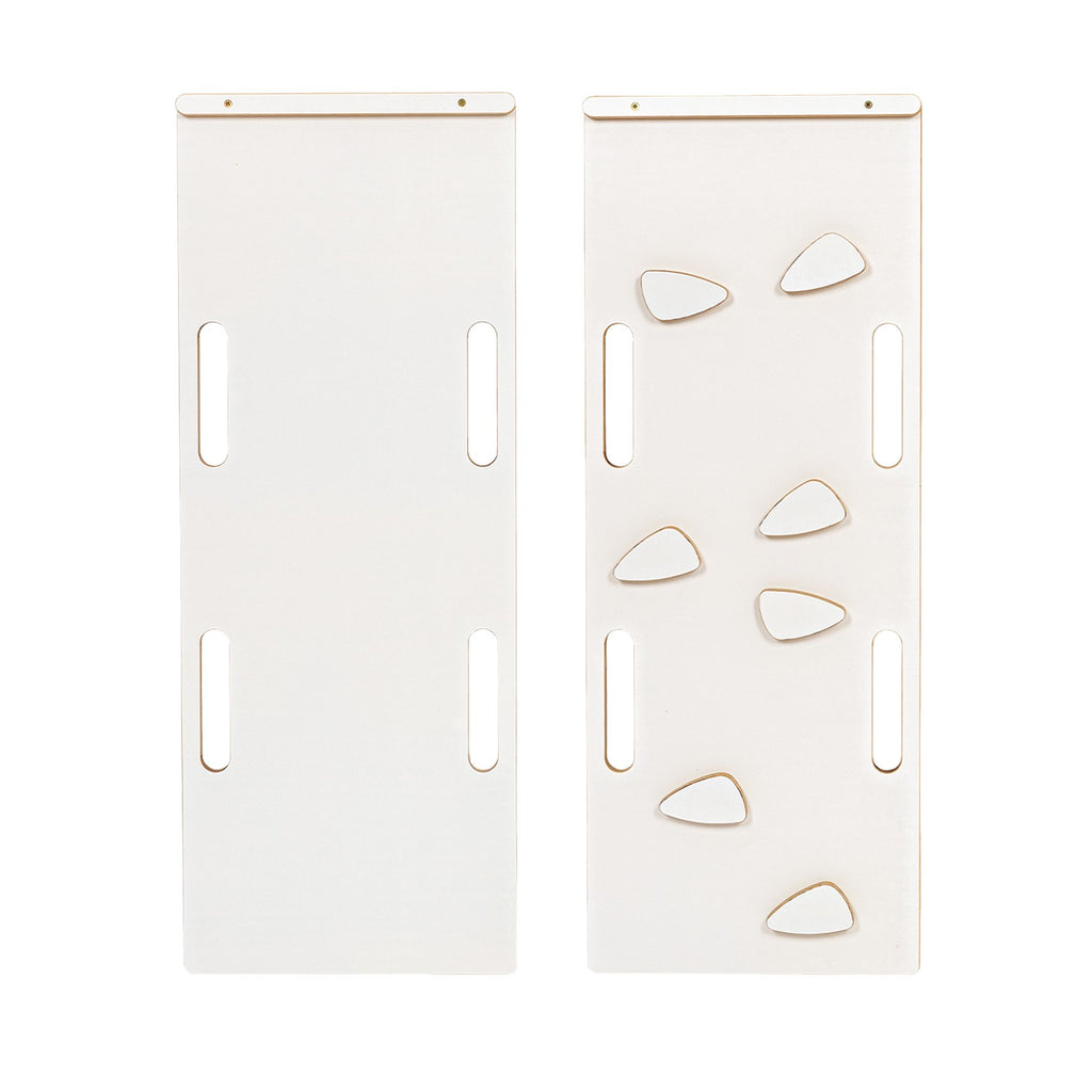 4. Flat lay of white slide and ladder panels with cut-out handles