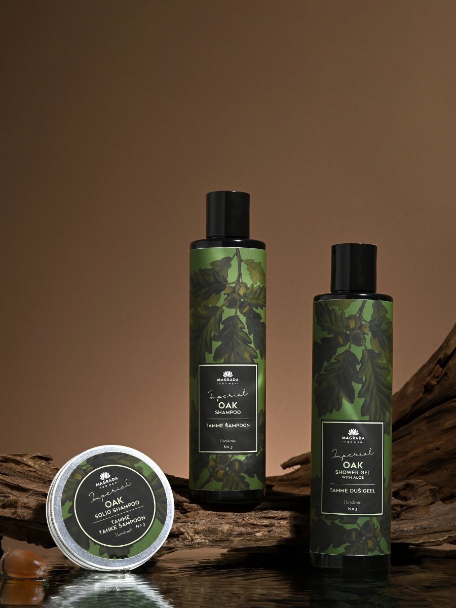 2. Studio shot of Magrada Organic Cosmetics Daily Essentials Gift Set for men, including oak shampoo, solid shampoo, and shower gel with oak leaf design