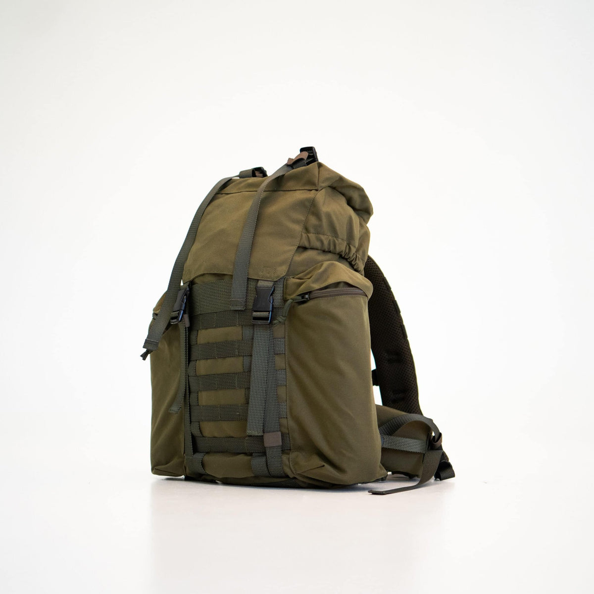 1. Galvi-Linda Patrol Backpack 077 in olive green, studio shot showing front with Molle system and side pockets