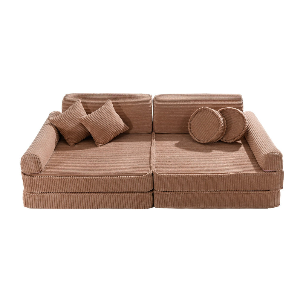 3. Modular children's sofa in powder pink corduroy with cushions, shown in a compact seating configuration