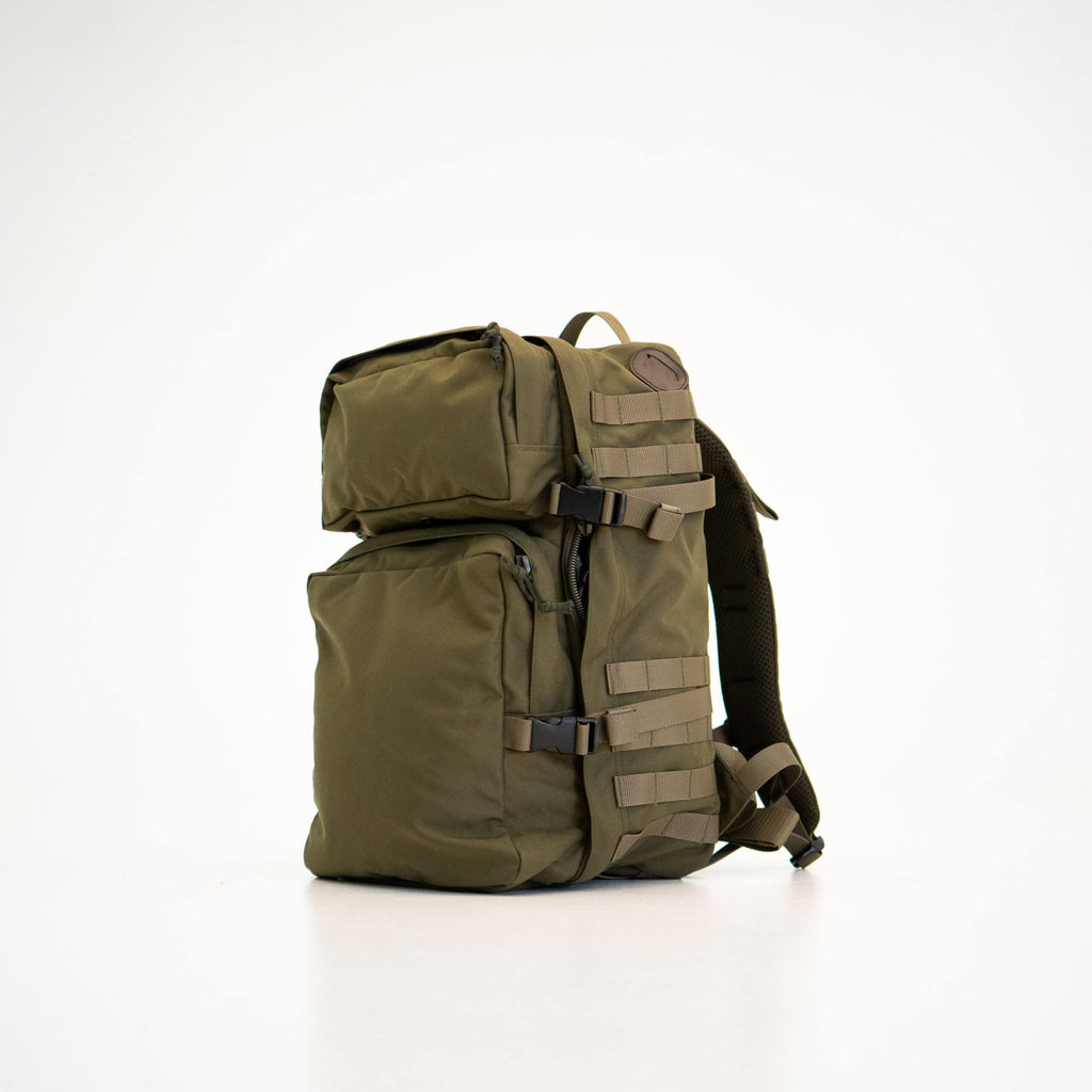 3. Studio image of Galvi-Linda Patrol Backpack 039 in military green, highlighting side view with Molle system and compression straps