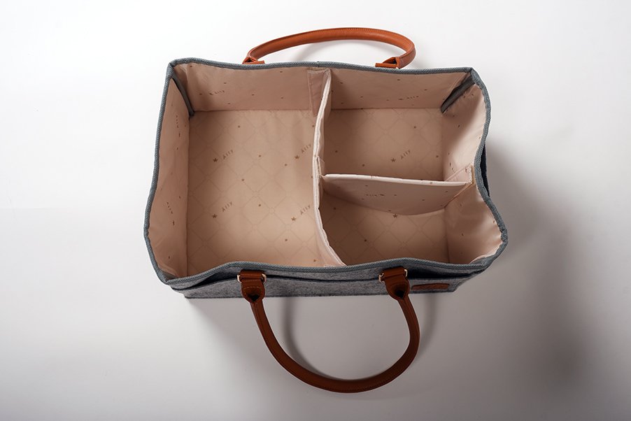 4. Interior view of Ally Scandic diaper caddy with removable partitions, showing customizable storage