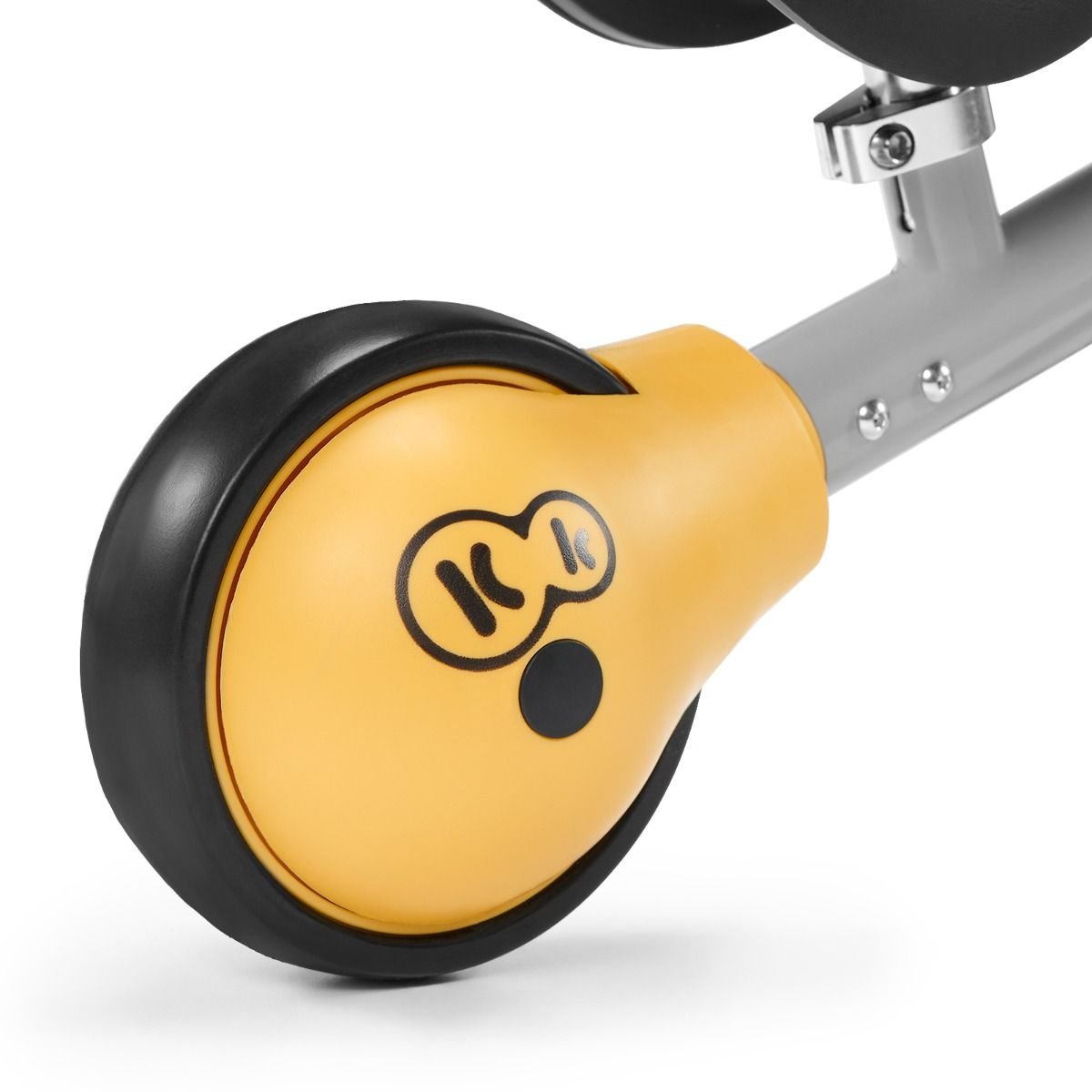 2. Close-up of yellow rear wheel with Kinderkraft logo on CUTIE balance bike