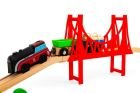 4. Close-up of red bridge with train and green wagon on wooden track