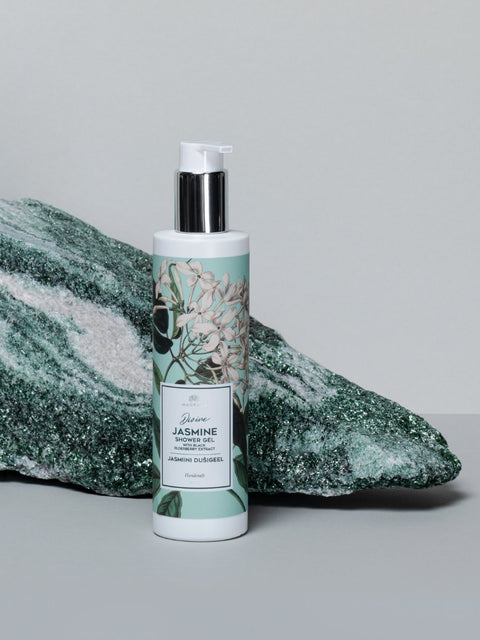 1. Magrada Organic Cosmetics Jasmine Shower Gel with black elderberry extract, 250 ml bottle, styled on a natural stone background