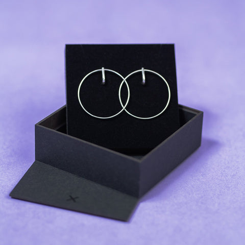 4. Maarja Palu LAYERS x1 large silver earrings displayed in open black gift box