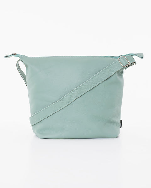 1. Trendbag Suvi XS shoulder bag in Sea Blue, front view, handmade from high-quality leather leftovers, versatile design with adjustable strap, studio setting