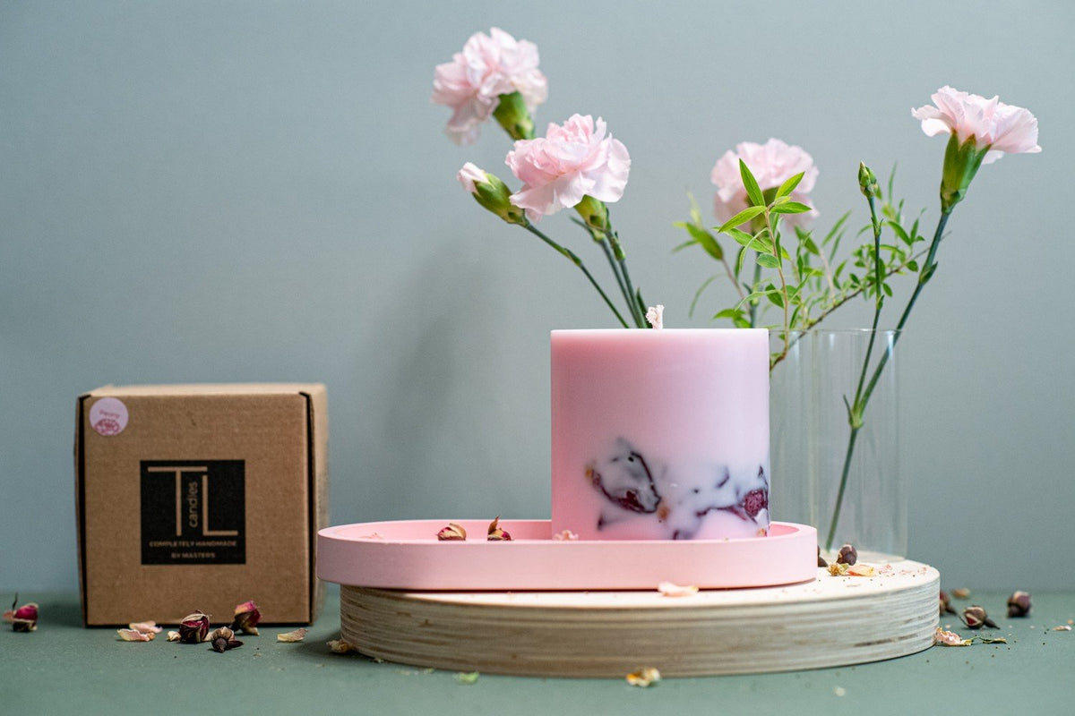 5. Hand-made soy wax candle with peony scent by TL Candles, shown with packaging and floral decor