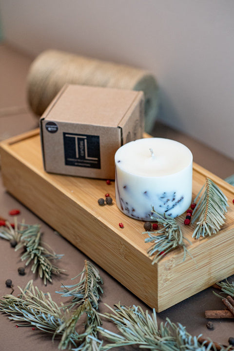 5. TL Candles box and white soy wax candle with lavender decoration, styled with natural elements