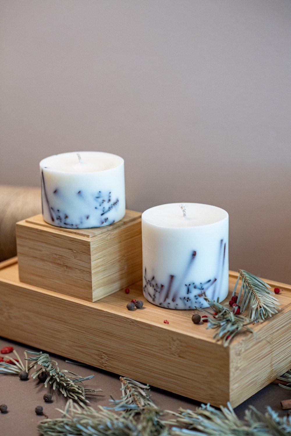 6. Pair of TL Candles soy wax candles with cinnamon and clove on wooden tray, showcasing rustic elegance