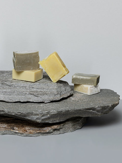 1. Assorted Magrada Nordic Birch Sap Soap bars displayed on natural stone, showcasing organic ingredients and handmade quality