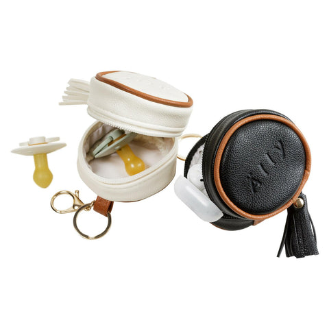 3. Close-up of Ally Scandic white and black pacifier bags, showing interior with pacifiers