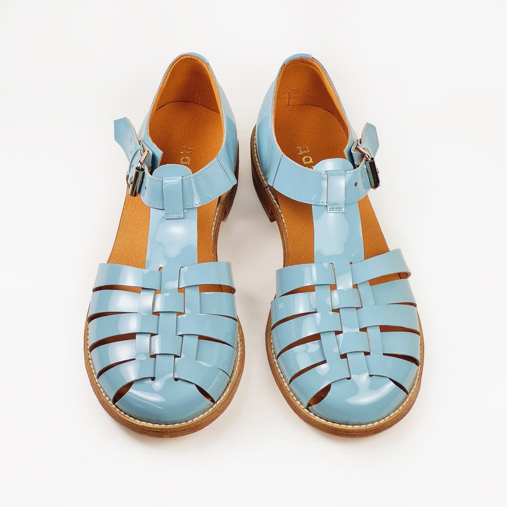 4. Studio shot of handmade leather fisherman sandals in light blue by Daz Studio, top view
